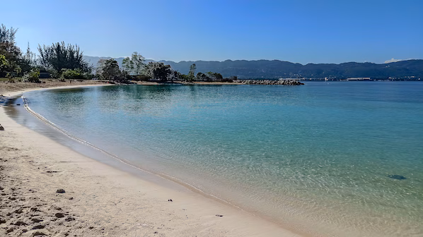 Dead End Beach near Secrets St. James Montego Bay with scenic shoreline and nearby plane spotting views