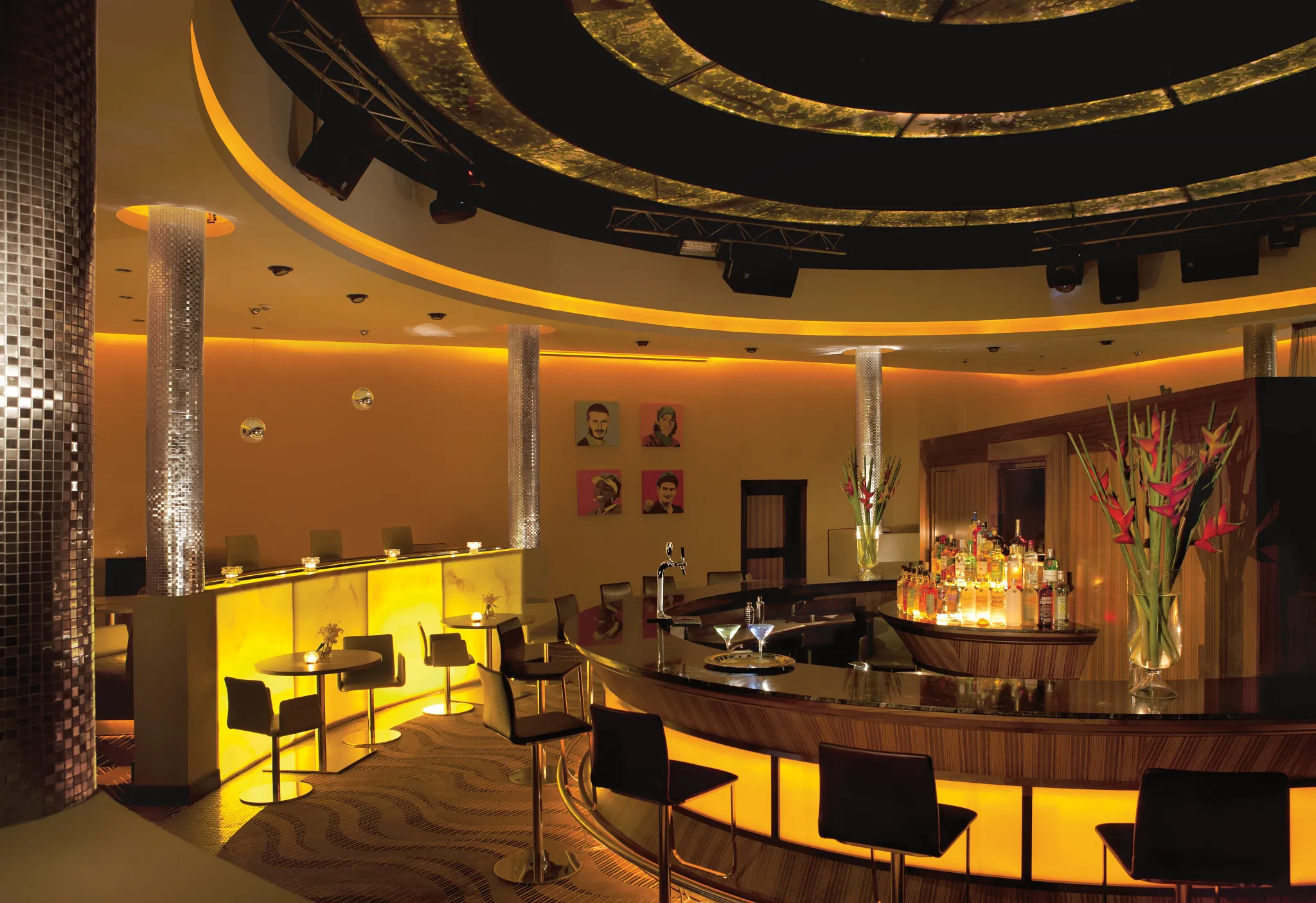 Desires sports bar and dance club at Secrets St. James Montego Bay featuring a vibrant nightlife atmosphere with DJ, dance floor, and lounge seating.