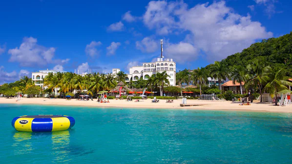 Doctor’s Cave Beach near Secrets St. James Montego Bay with turquoise water and white sand shoreline