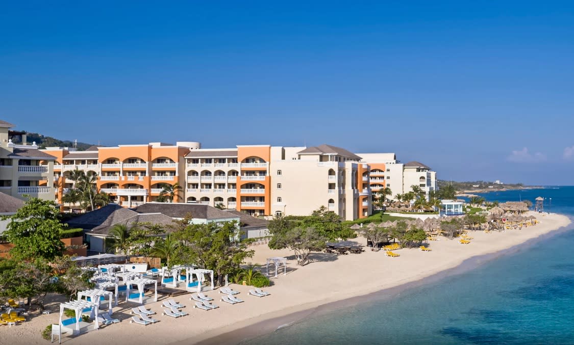 Iberostar Rose Hall Beach family-friendly all-inclusive resort in Jamaica with pools, beach access, and tropical grounds.