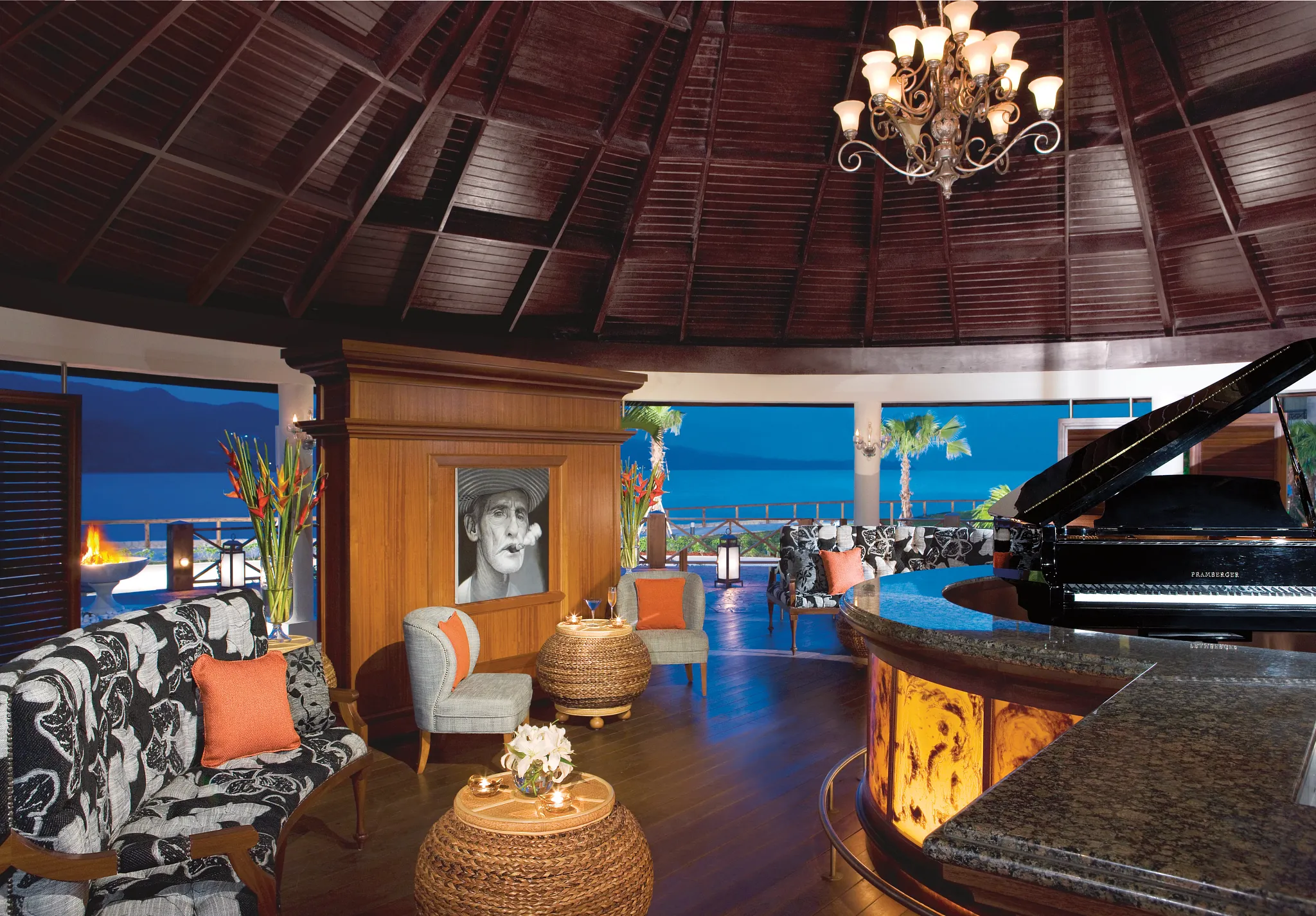 Piano Bar at Secrets St. James Montego Bay featuring a Cuban-themed lounge with live piano music, elegant seating, and a relaxed nightlife atmosphere.