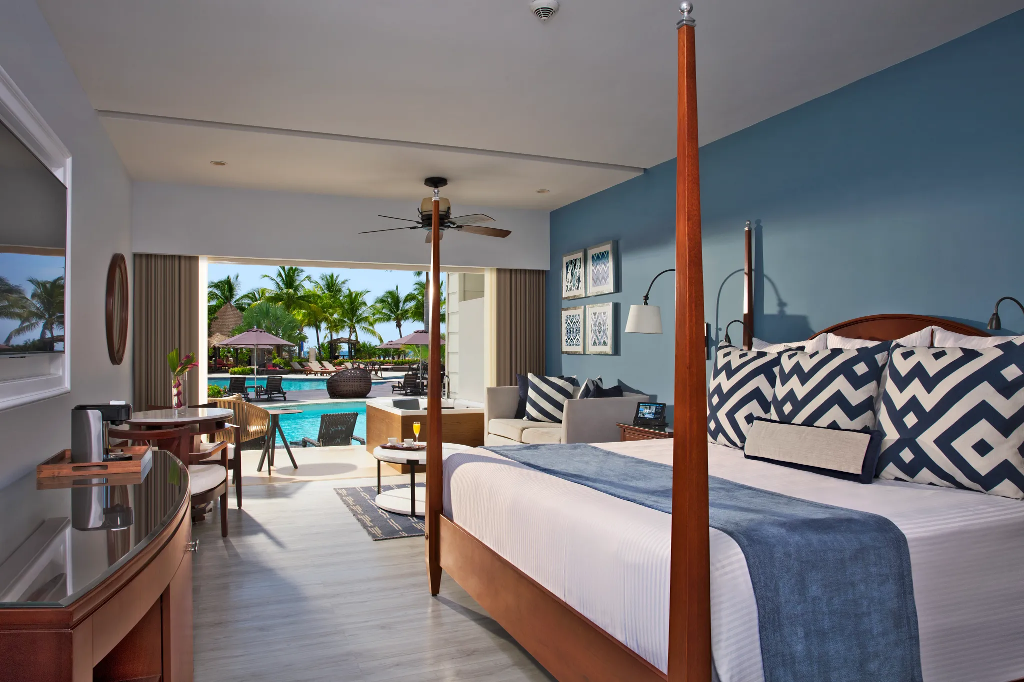 Preferred Club Junior Suite Ocean View Swim Out with king bed and direct pool access at Secrets St. James Montego Bay.