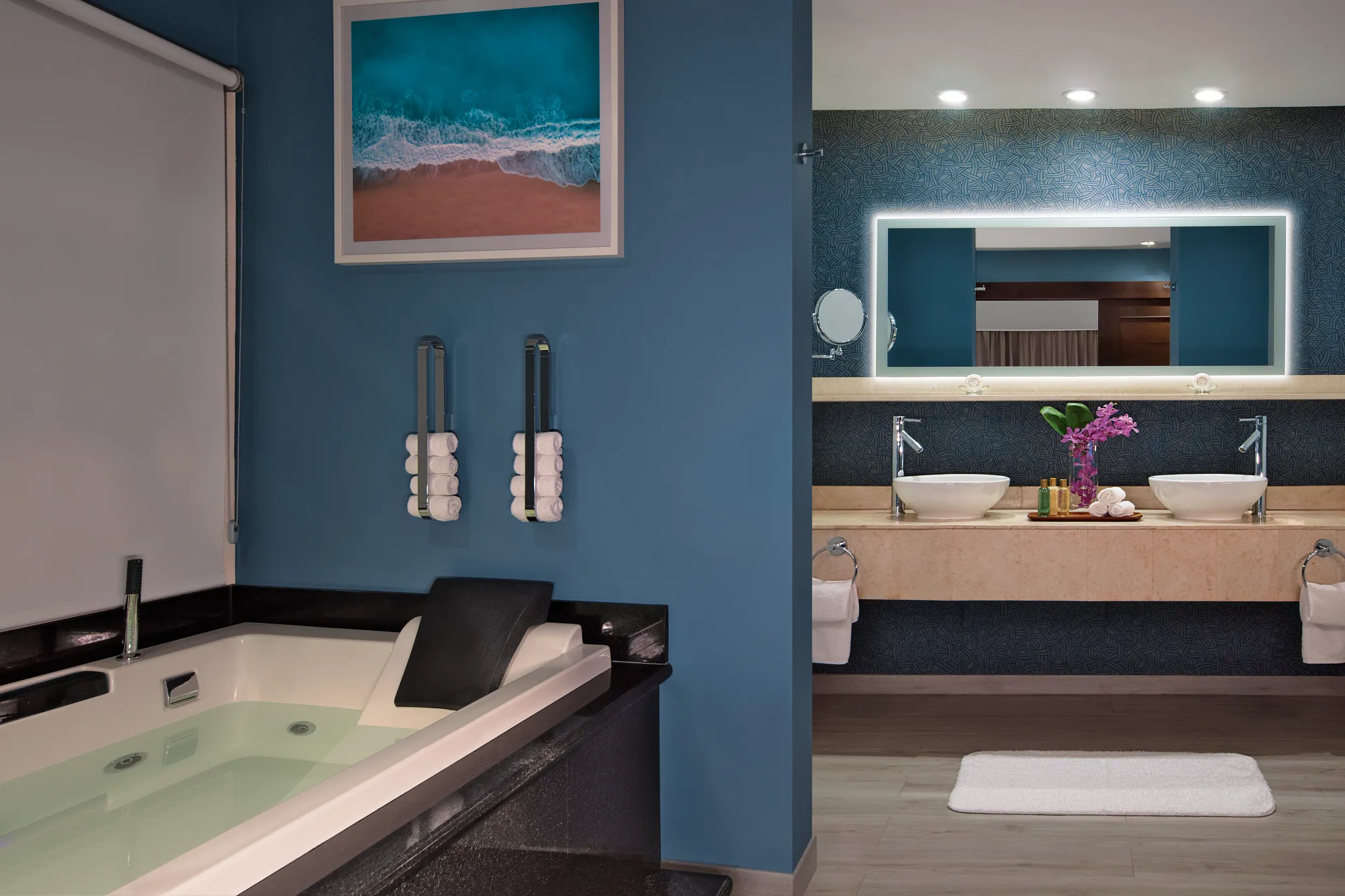 Preferred Club Presidential Suite Ocean Front bathroom with hydro tub and double vanity at Secrets St. James Montego Bay.