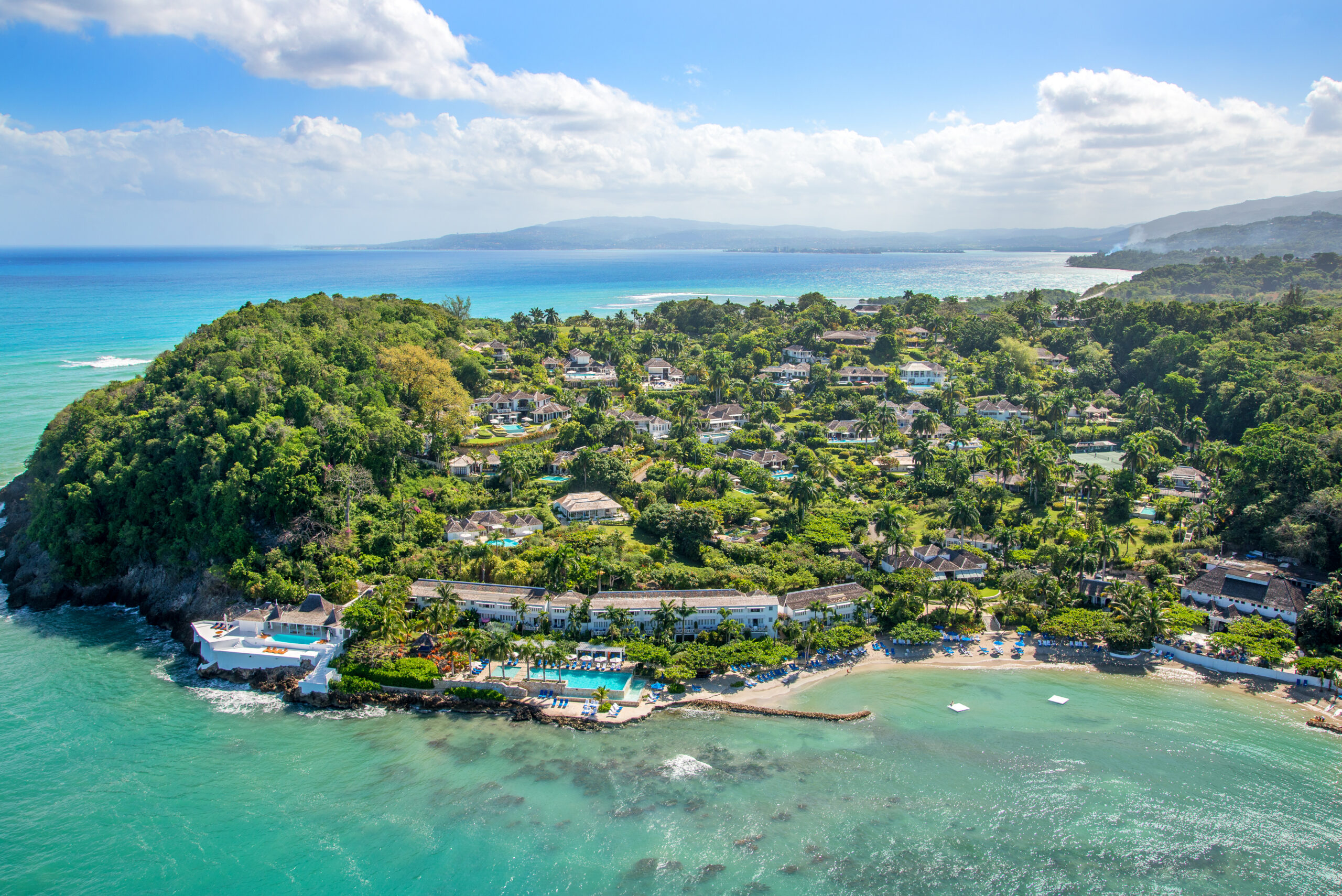 Round Hill Hotel and Villas luxury boutique resort in Montego Bay Jamaica with private villas, Ralph Lauren design, and secluded beach.