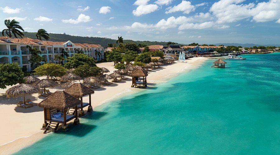 Sandals Montego Bay couples-only all-inclusive resort with private beach, overwater bungalows, and tropical gardens in Jamaica.