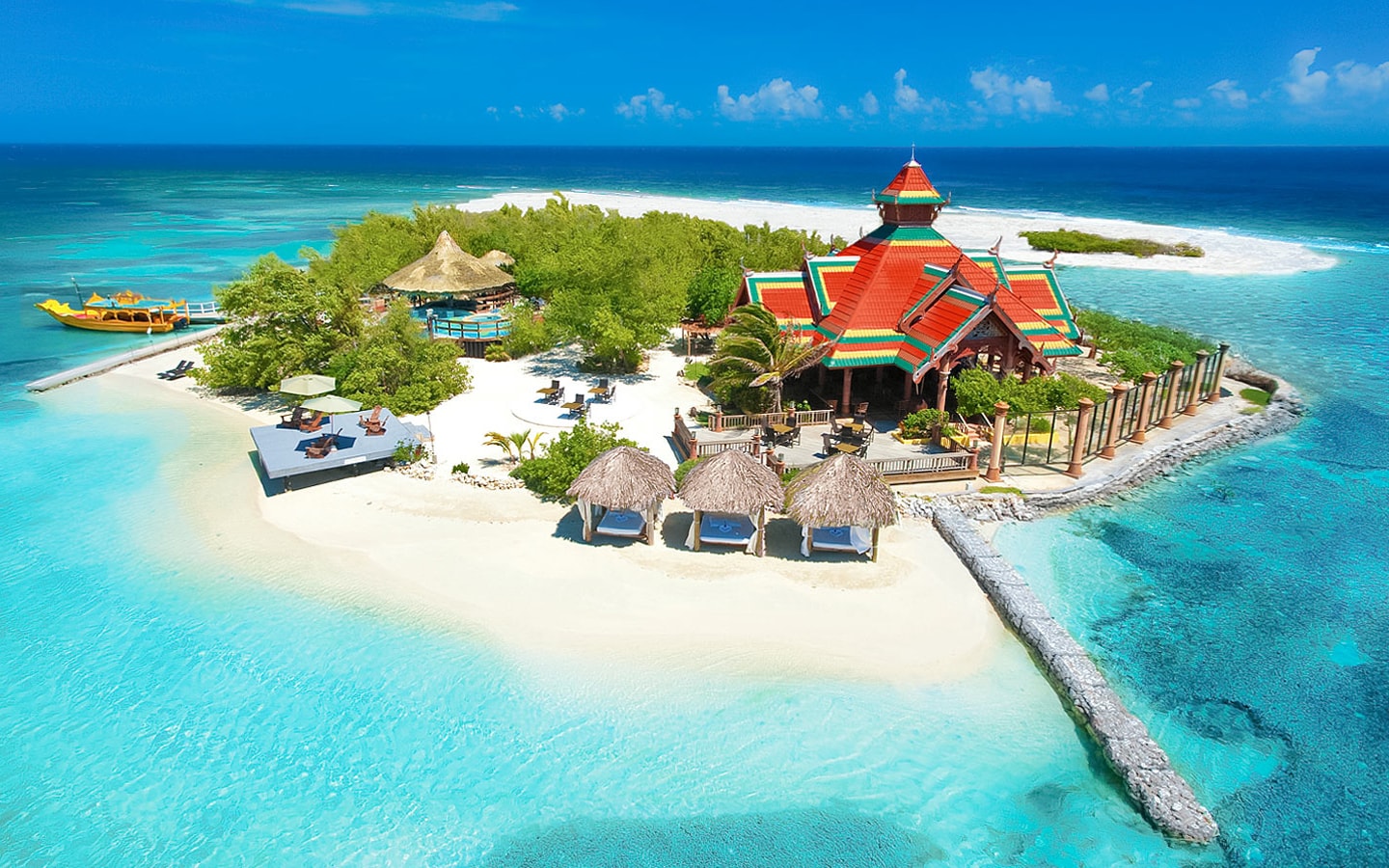 Sandals Royal Caribbean couples-only all-inclusive resort with private offshore island, overwater bungalows, and Caribbean luxury in Montego Bay.