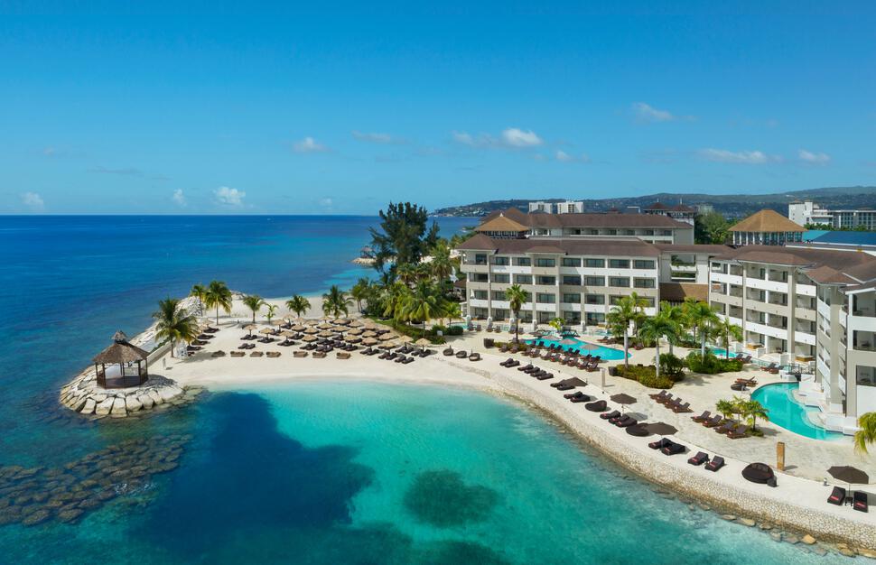 Secrets Wild Orchid Montego Bay adults-only all-inclusive resort in Jamaica with modern suites, swim-out pools, and beachfront Caribbean setting.