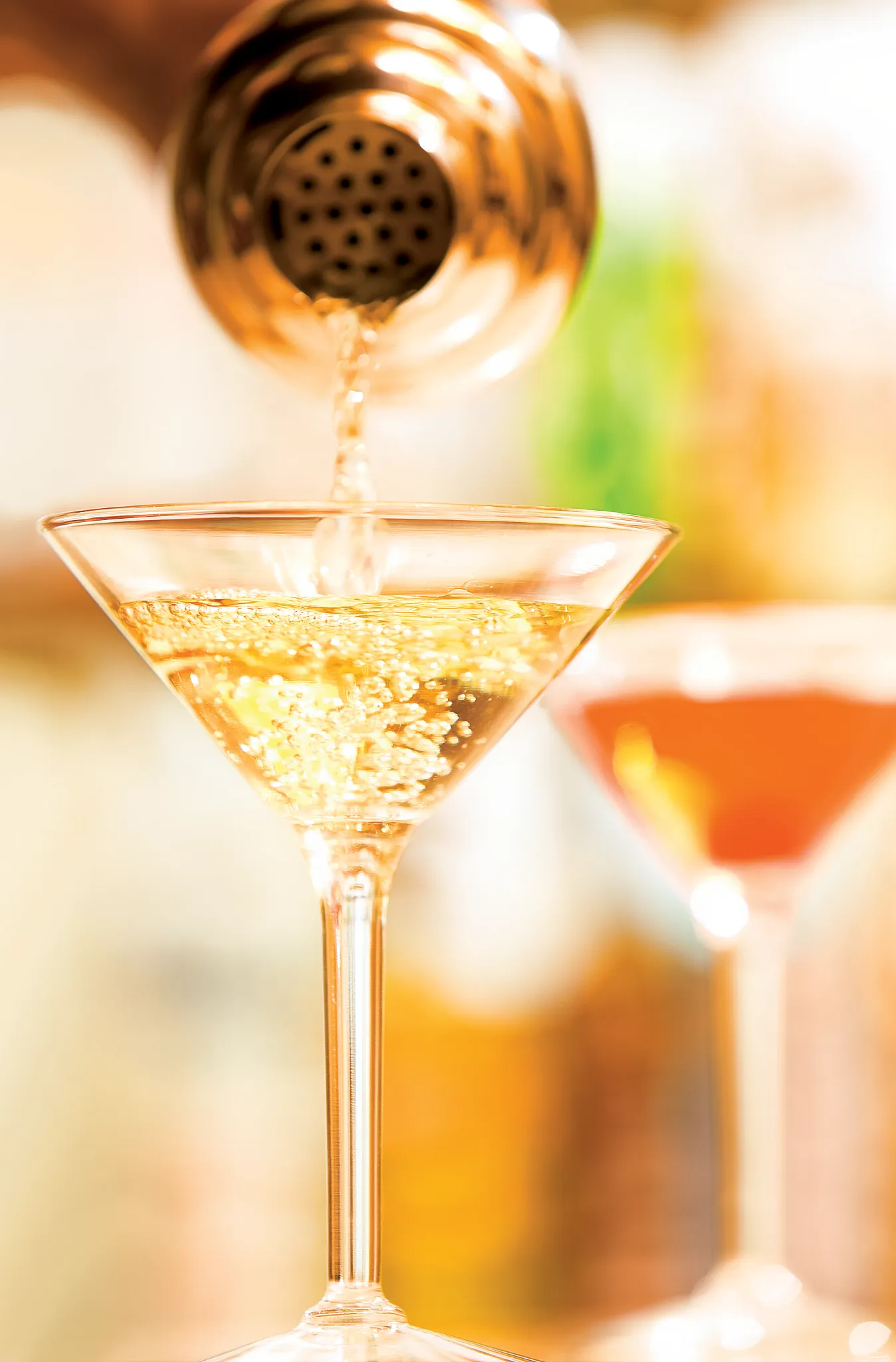 The Lounge bar at Secrets St. James Montego Bay featuring elegant seating, baby grand piano, and live music in a relaxed setting.